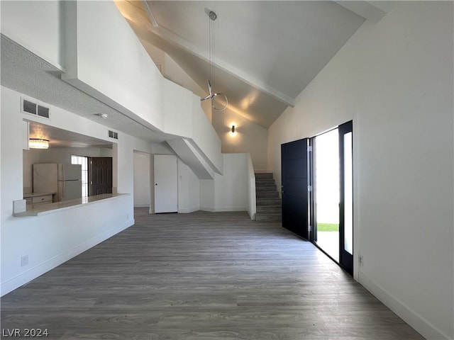 additional living space featuring dark hardwood / wood-style floors and high vaulted ceiling