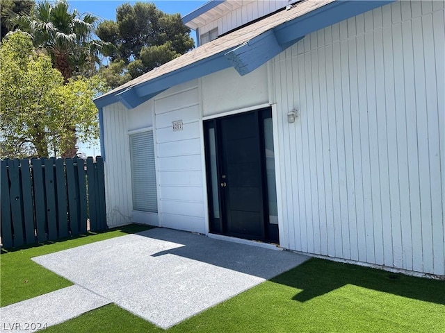 doorway to property with a patio