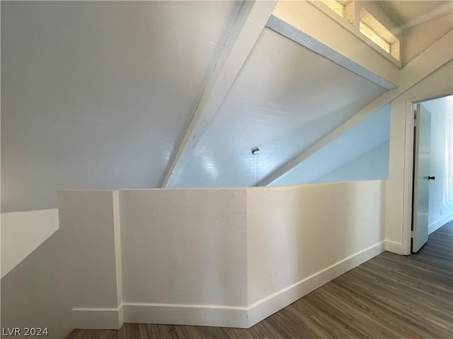 interior space featuring lofted ceiling and wood-type flooring