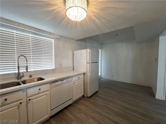 kitchen featuring sink, white appliances, dark hardwood / wood-style floors, and white cabinets