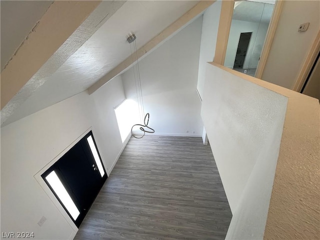 hallway with dark wood-type flooring