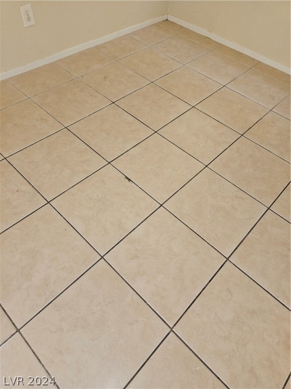 details featuring tile patterned flooring