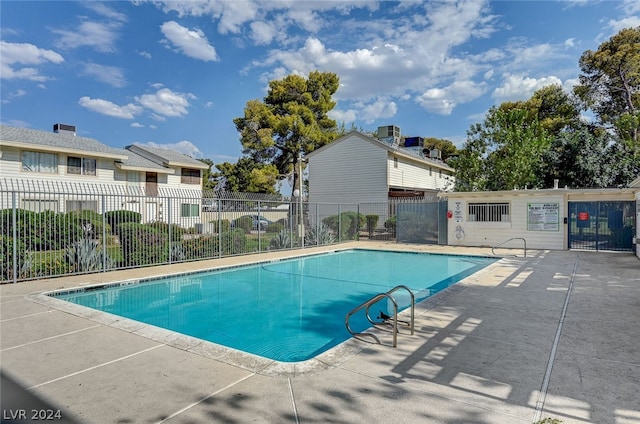 view of pool with a patio area