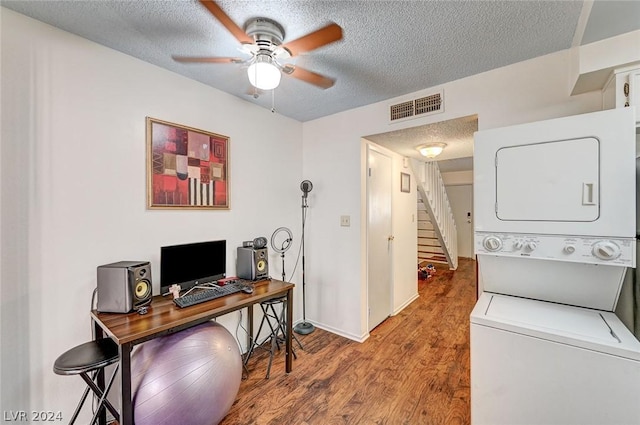 4770 Topaz St Unit 18, Las Vegas, NV 89121 - office area featuring wood finished floors, visible vents, ceiling fan, stacked washer and clothes dryer, and a textured ceiling