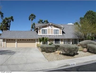 front of property with a garage