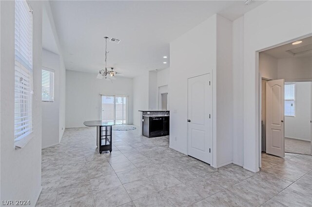 kitchen with light tile patterned floors