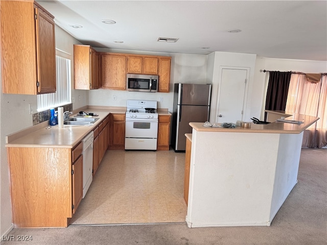 kitchen featuring sink and appliances with stainless steel finishes