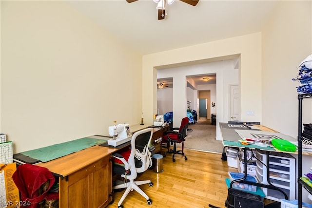 office space featuring light hardwood / wood-style flooring and ceiling fan