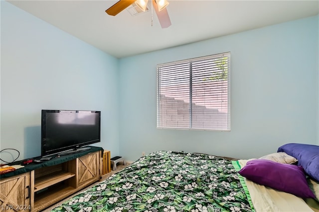 bedroom featuring ceiling fan