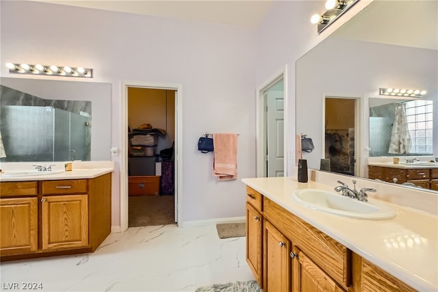 1505 Barrington Oaks St, North Las Vegas, NV 89084 - full bath featuring marble finish floors, a shower stall, baseboards, two vanities, and a bathtub