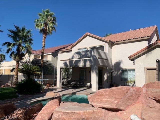 rear view of house with a patio area