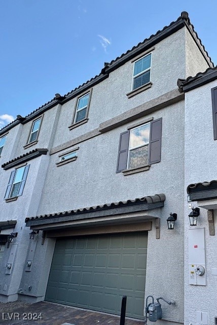 view of home's exterior with a garage