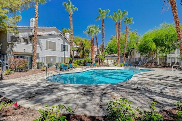 view of swimming pool featuring a patio area