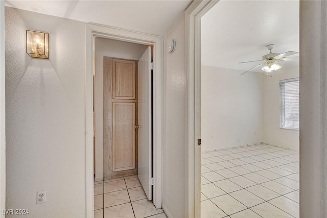 hallway with light tile patterned flooring