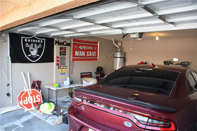 garage with a garage door opener and secured water heater