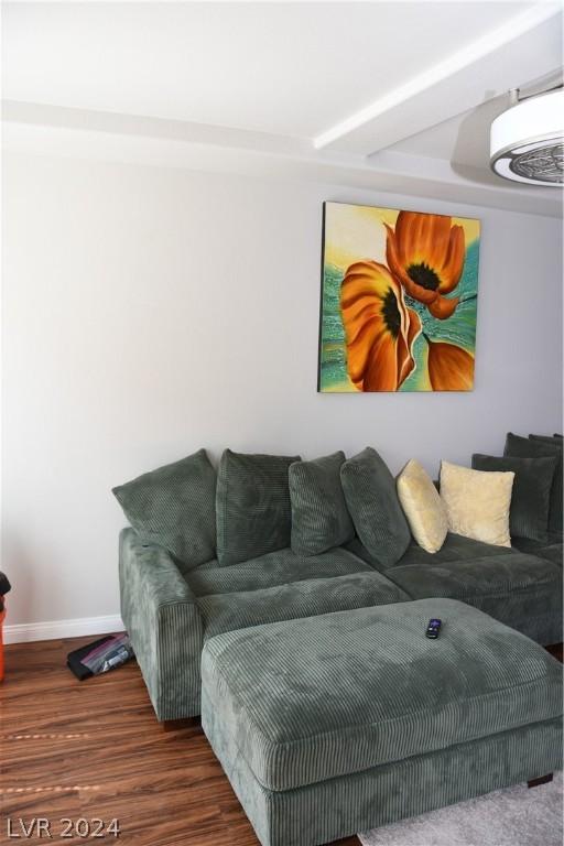 living room with dark hardwood / wood-style floors