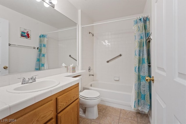 full bathroom with tile patterned floors, vanity, toilet, and shower / tub combo