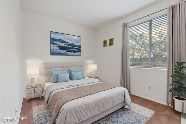 bedroom featuring carpet floors