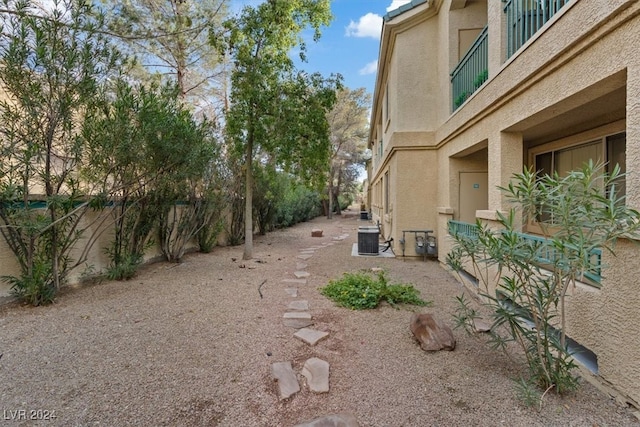 view of yard featuring central AC