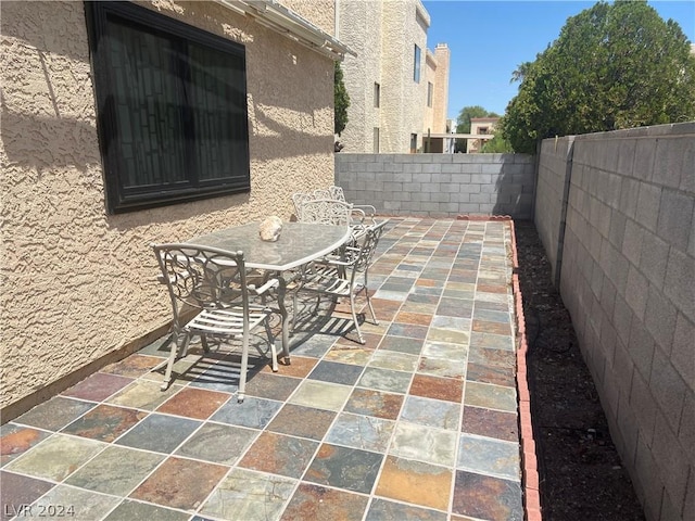 view of patio / terrace with outdoor dining area and a fenced backyard