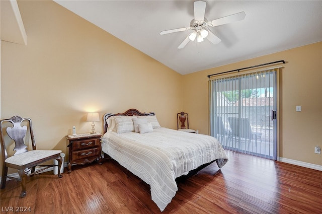 bedroom featuring access to outside, vaulted ceiling, dark hardwood / wood-style flooring, and ceiling fan