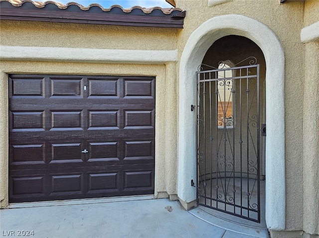 property entrance featuring a garage