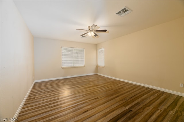 unfurnished room with wood-type flooring and ceiling fan