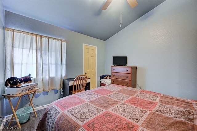 bedroom featuring ceiling fan and lofted ceiling