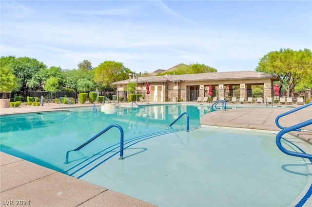 view of pool featuring a patio area