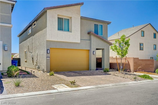 view of front of house with a garage