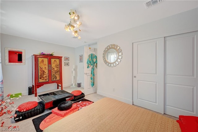 carpeted bedroom featuring a closet