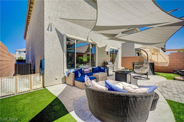 view of patio / terrace with cooling unit, grilling area, and an outdoor living space with a fire pit