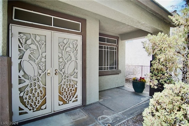 property entrance with french doors