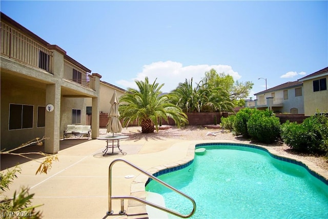 view of pool with a patio area