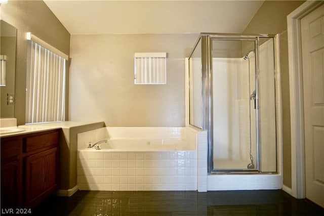 bathroom with vanity, shower with separate bathtub, and tile patterned floors