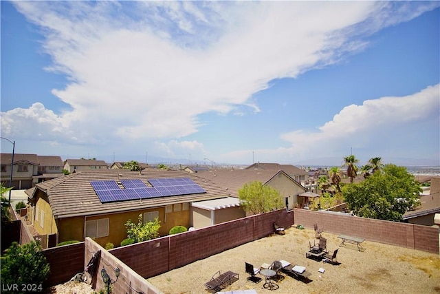 exterior space featuring solar panels