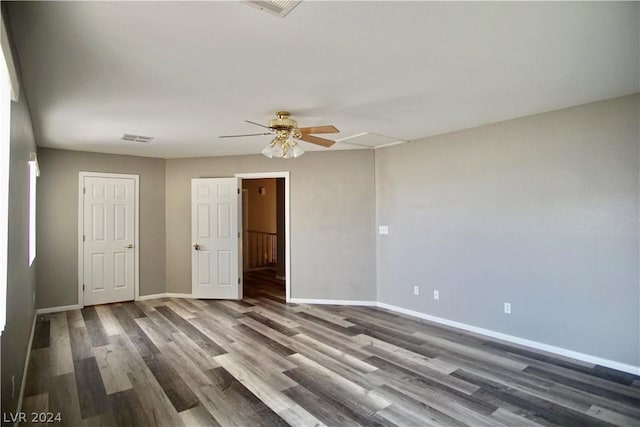 empty room featuring hardwood / wood-style flooring