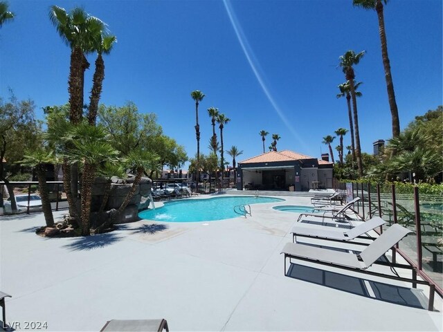 view of pool featuring a patio area