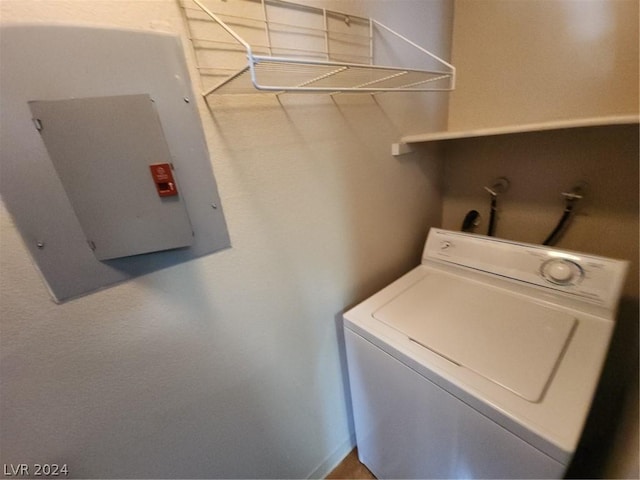 laundry area featuring washer / clothes dryer and electric panel