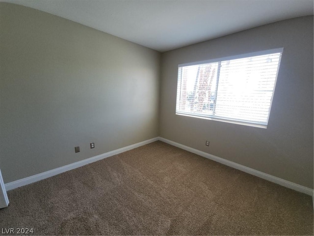 view of carpeted spare room