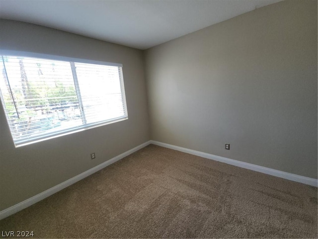 view of carpeted spare room