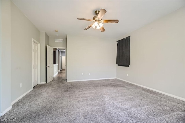 unfurnished room with carpet floors and ceiling fan