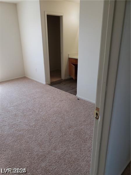 unfurnished bedroom with carpet flooring