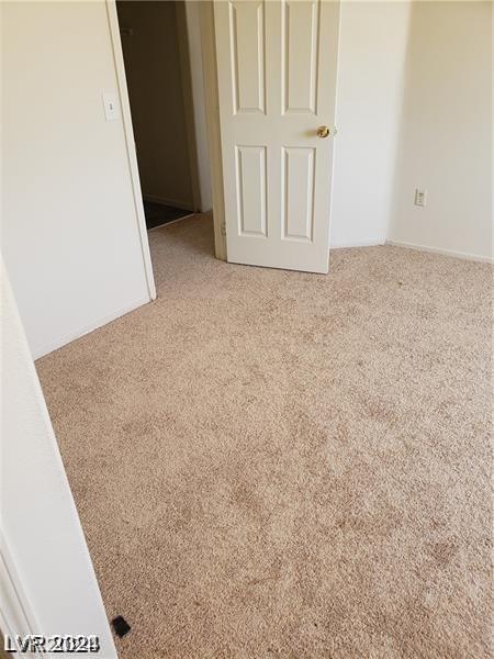 unfurnished room with carpet