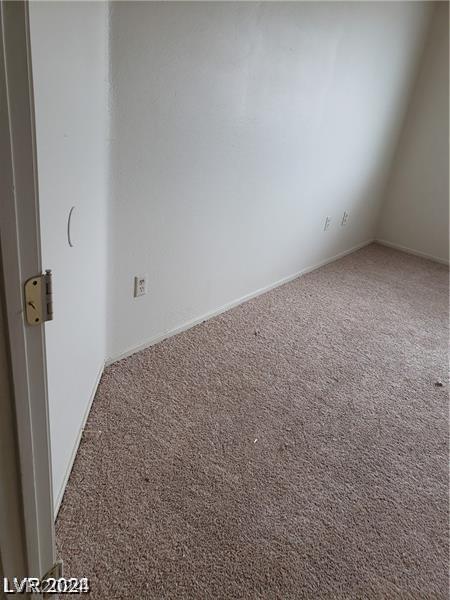 unfurnished room with carpet floors