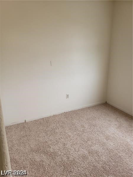 unfurnished room with carpet