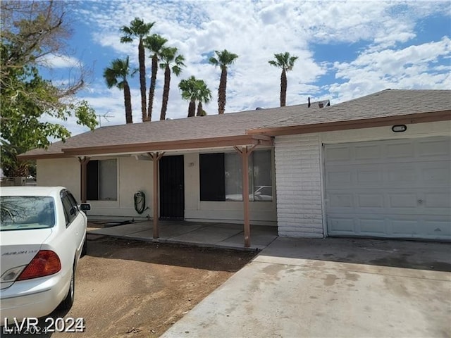 ranch-style house with a garage