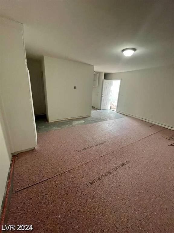 unfurnished room with carpet