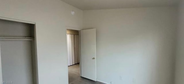 unfurnished bedroom featuring a closet