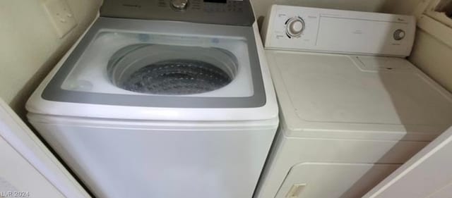 washroom with washer / clothes dryer